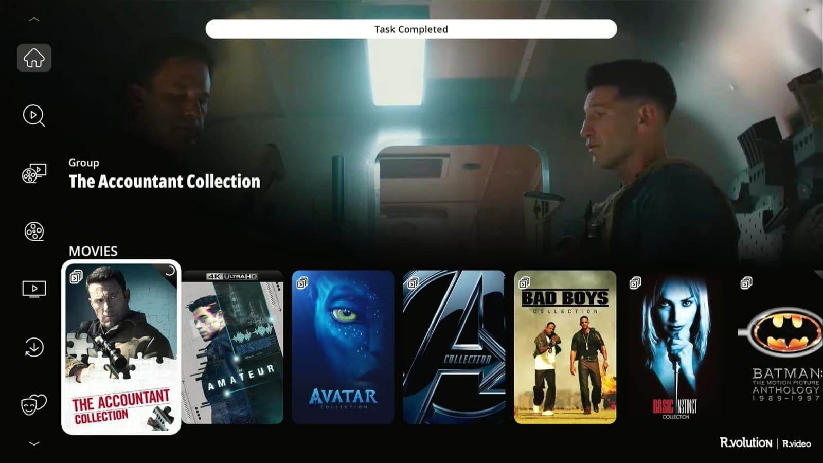 The R_video user interface showing a horizontal movie wall with poster art and collection groups